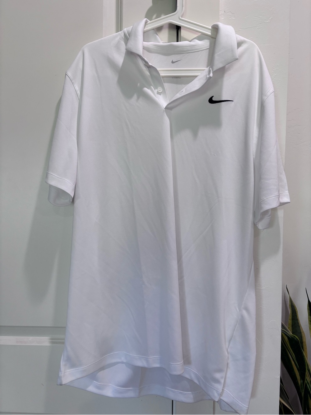 Nike Men's White Polo with Black Swoosh